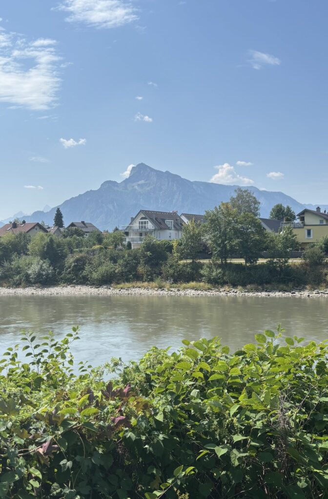Summer at Salzach River, Salzburg with Untersberg Mountain in the distance